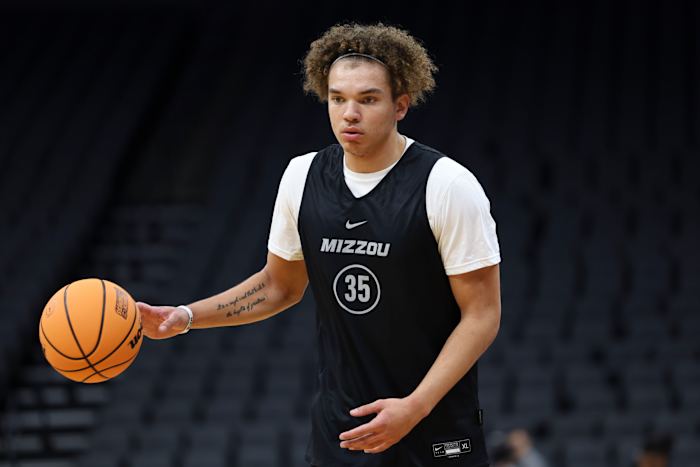 Mar 15, 2023; Sacramento, CA, USA; Missouri Tigers forward Noah Carter (35) dribbles during practice.